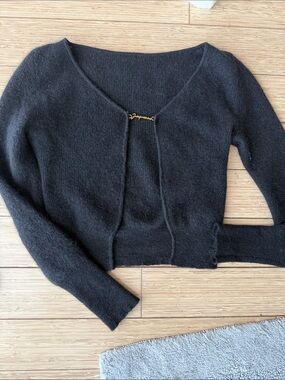 Jacquemus Black Cropped V-Neck Sweater with Gold Script Pin